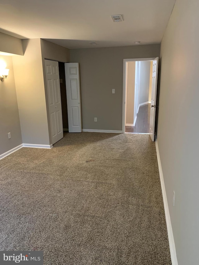 unfurnished bedroom with carpet flooring