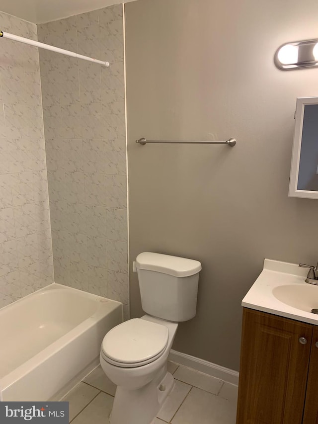 full bathroom with tile patterned flooring, vanity, toilet, and tiled shower / bath