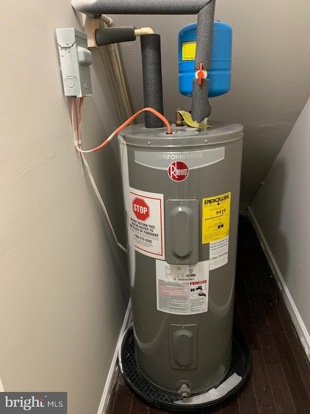 utility room with water heater