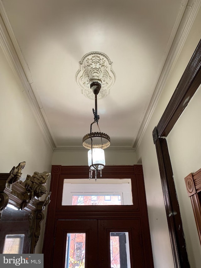 details with crown molding and french doors