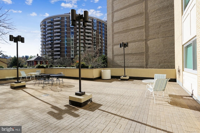 surrounding community featuring a patio