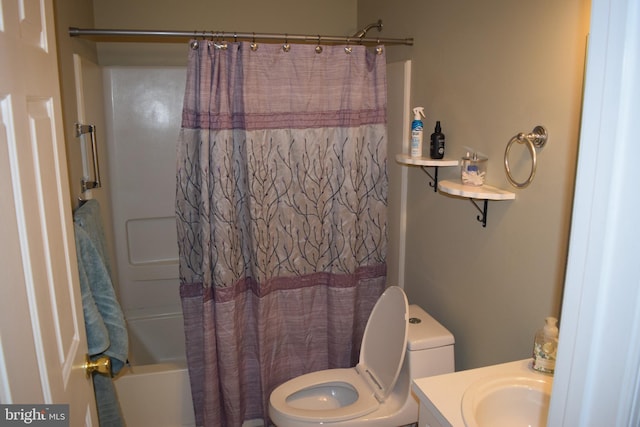 full bathroom with vanity, toilet, and shower / tub combo with curtain