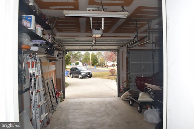 garage featuring a garage door opener