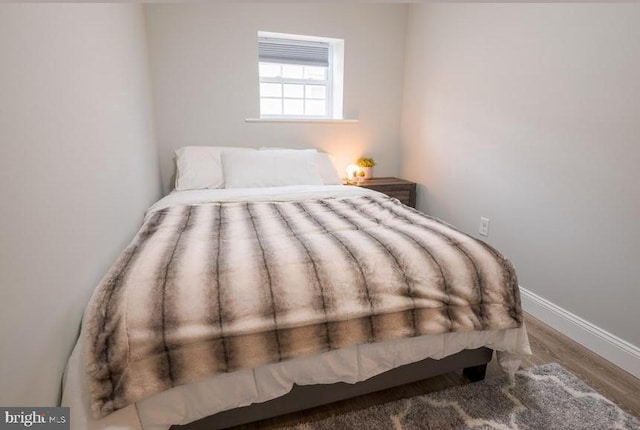 bedroom featuring hardwood / wood-style flooring