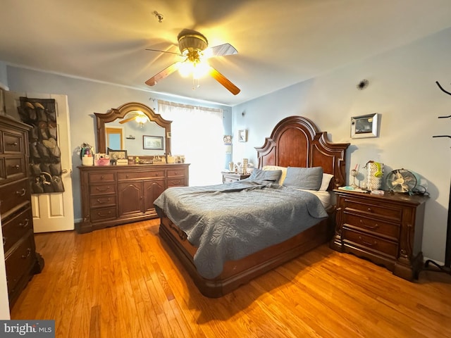 bedroom featuring ceiling fan and light wood-type flooring