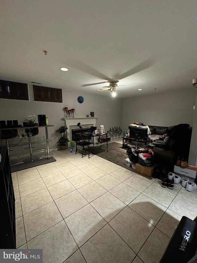 interior space featuring ceiling fan