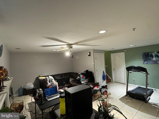 living room with light tile patterned floors and ceiling fan