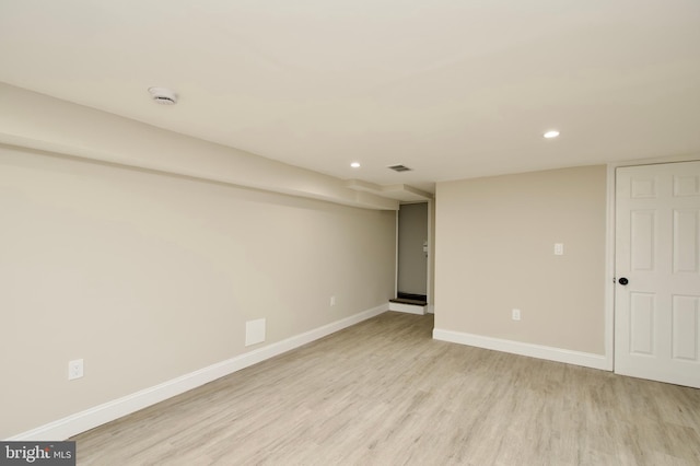 basement with light wood-type flooring