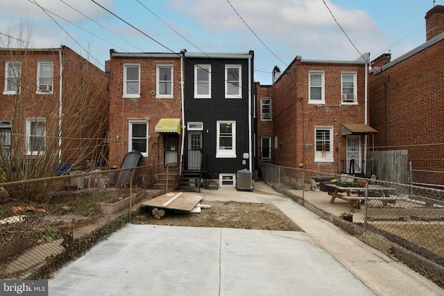 view of front of house featuring central AC