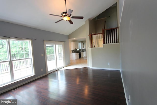 12360 Corncrib Ct, Bristow, VA 20136 - unfurnished living room featuring wood finished floors, ceiling fan, baseboards, and high vaulted ceiling