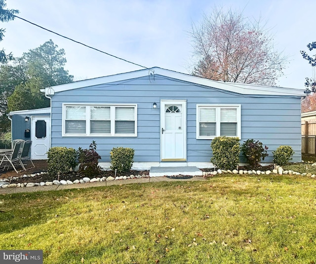 view of front of home with a front yard