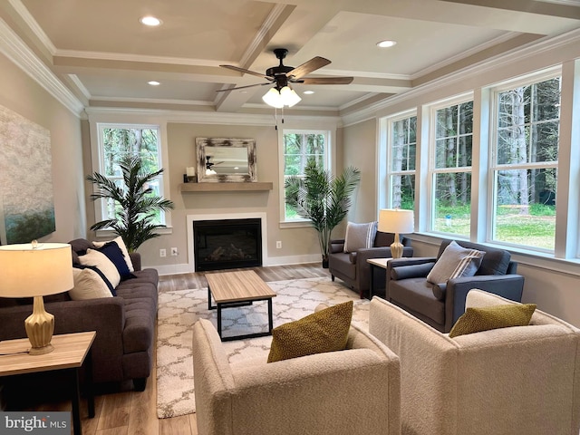 3104 Paper Mill Rd, Phoenix, MD 21131 - living room featuring light wood-style flooring, plenty of natural light, beam ceiling, coffered ceiling, and crown molding