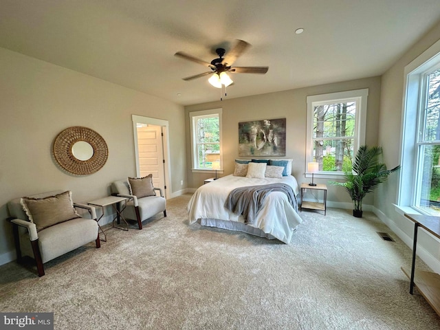 3104 Paper Mill Rd, Phoenix, MD 21131 - carpeted bedroom featuring multiple windows, baseboards, and a ceiling fan