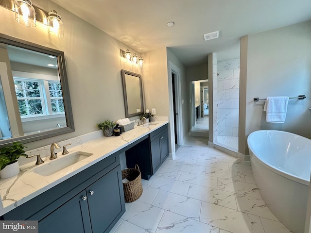 3104 Paper Mill Rd, Phoenix, MD 21131 - bathroom featuring marble look tiles, double vanity, a freestanding tub, and a shower