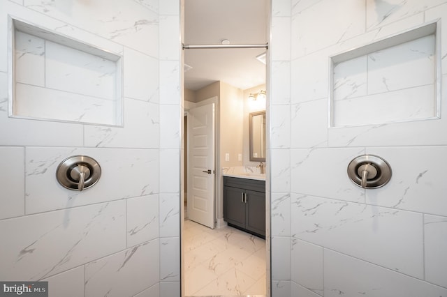 3104 Paper Mill Rd, Phoenix, MD 21131 - bathroom with a tile shower, vanity, and marble finish floors