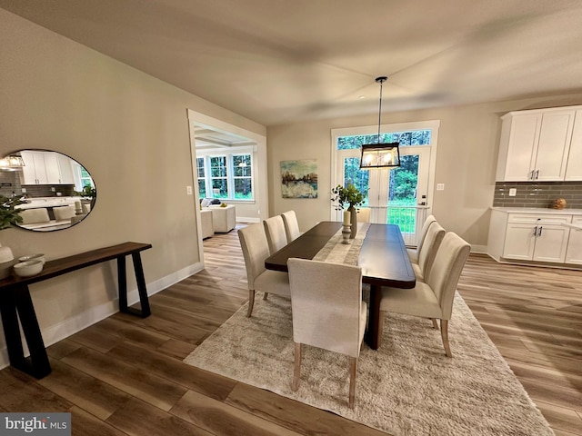 3104 Paper Mill Rd, Phoenix, MD 21131 - dining room with dark wood-type flooring and baseboards