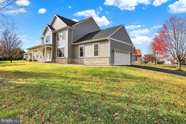 view of side of home featuring a lawn