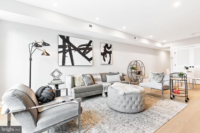 living room with hardwood / wood-style flooring