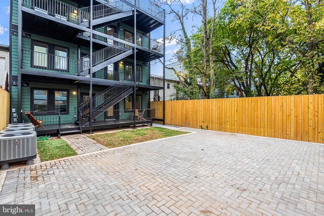 exterior space featuring central AC unit