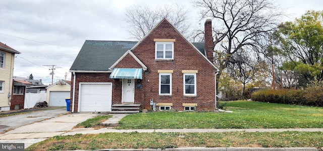 view of front of house featuring a garage and a front lawn