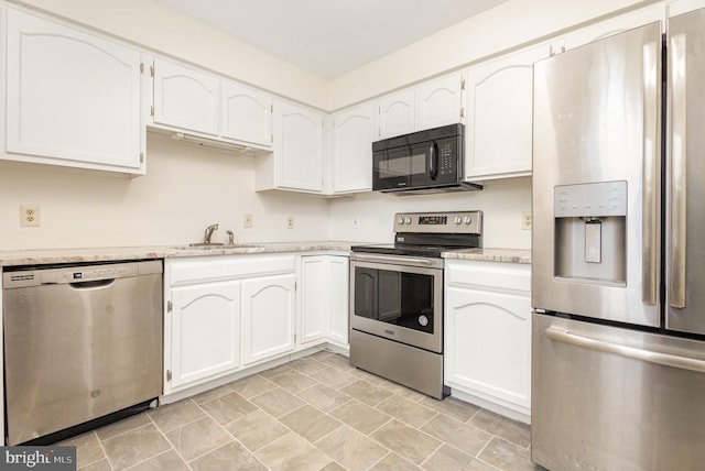 kitchen featuring white cabinetry, sink, and stainless steel appliances