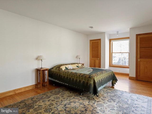 bedroom with hardwood / wood-style floors