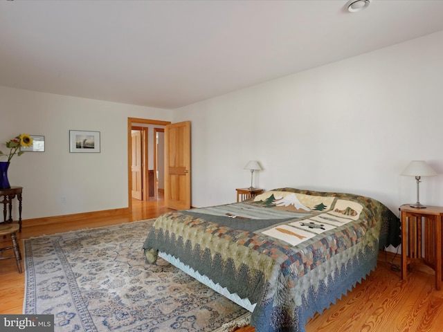 bedroom featuring hardwood / wood-style floors