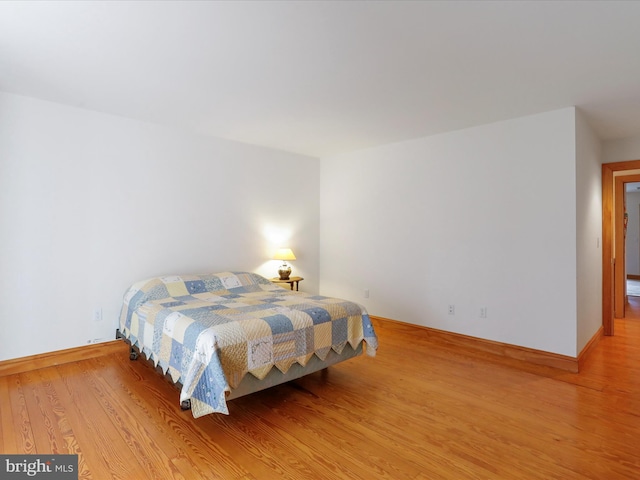 bedroom featuring light hardwood / wood-style flooring