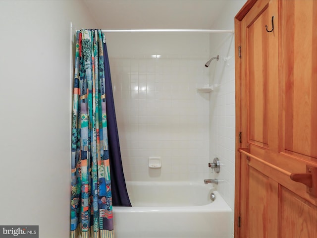 bathroom with shower / tub combo