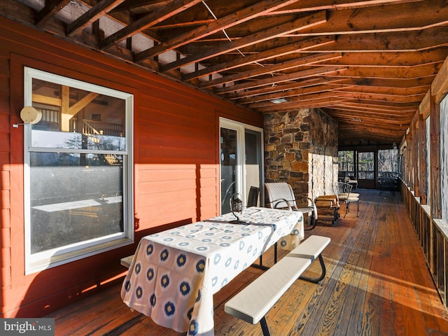 sunroom / solarium with vaulted ceiling