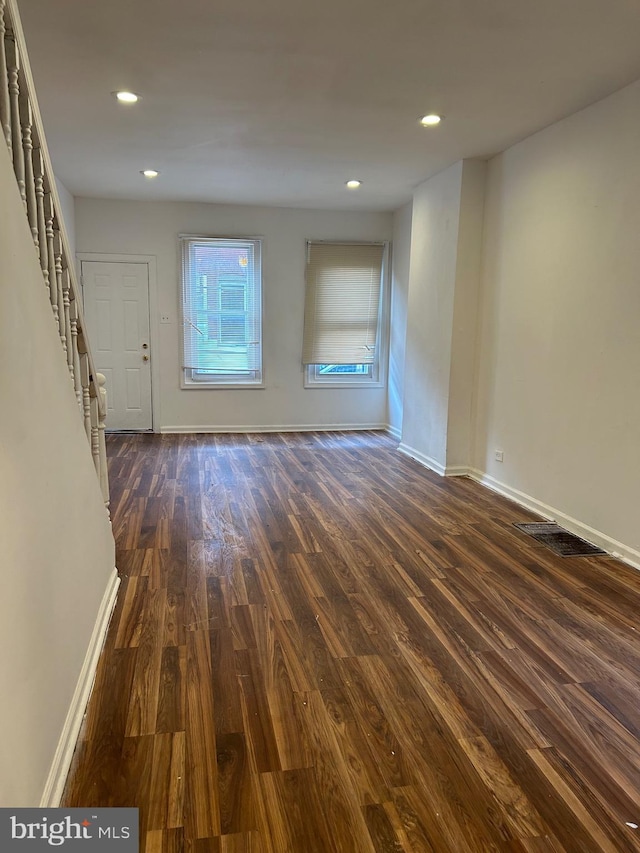 interior space with dark wood-type flooring