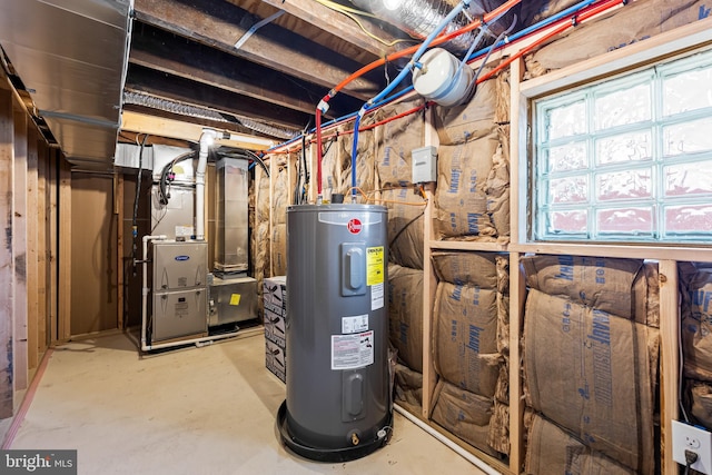 utility room with heating unit and water heater