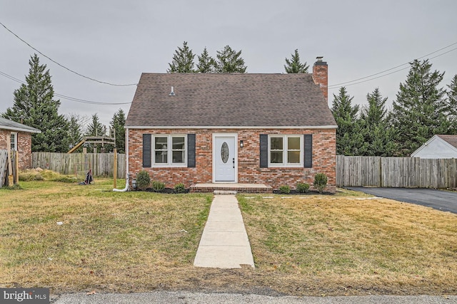 view of front of home with a front yard