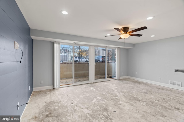 spare room with ceiling fan