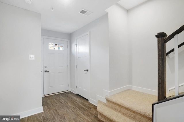 foyer entrance with wood-type flooring