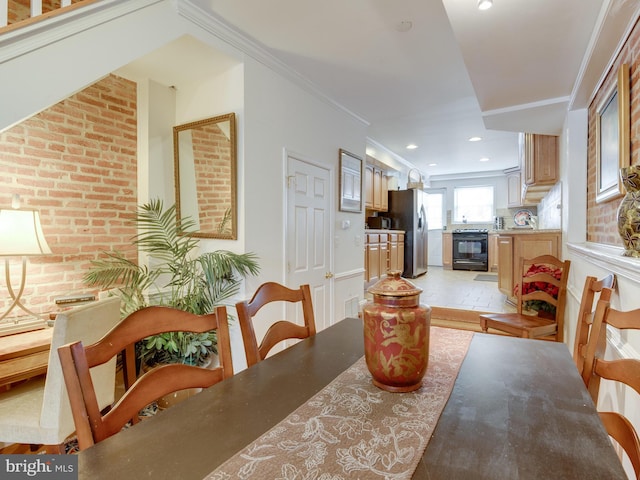 dining area with crown molding