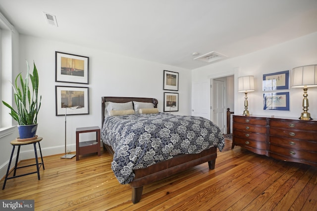 bedroom featuring light wood-type flooring