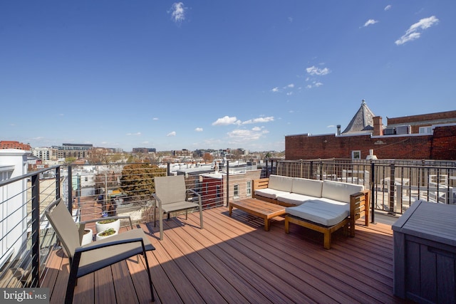 wooden deck featuring outdoor lounge area