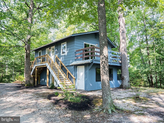 view of front of house with a wooden deck