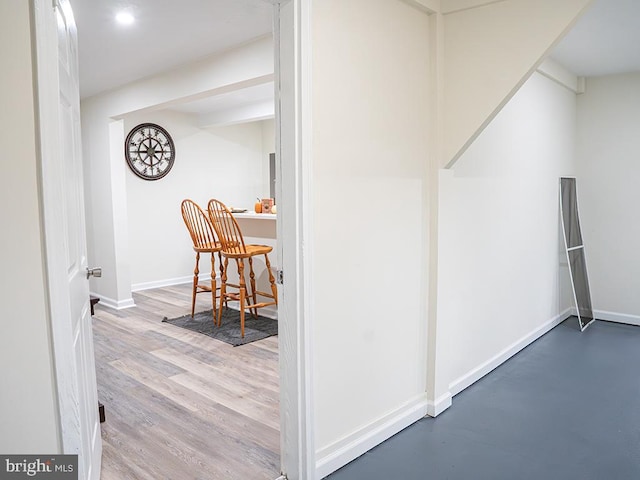 hall featuring wood-type flooring