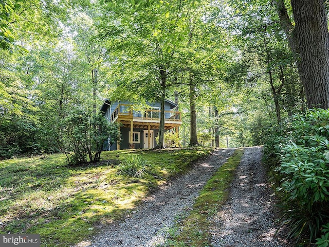 view of front of property featuring a wooden deck