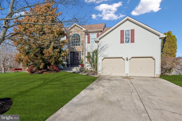 view of front of property featuring a front yard and a garage