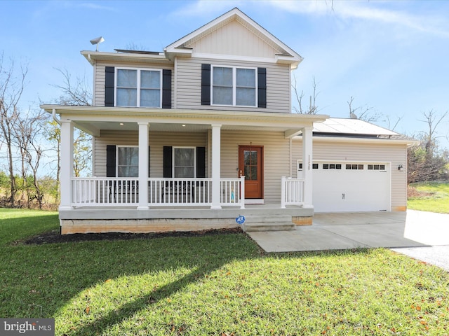 view of front facade with covered porch, a front yard, and a garage