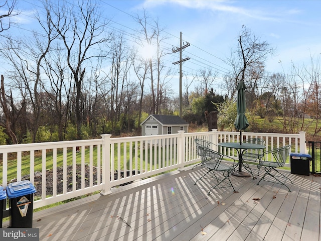 1150 Lewisville Rd, Berryville, VA 22611 - deck featuring outdoor dining area and view of wooded area