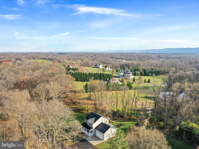 birds eye view of property featuring a rural view