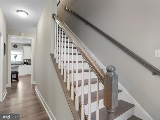 1150 Lewisville Rd, Berryville, VA 22611 - staircase featuring wood finished floors and baseboards