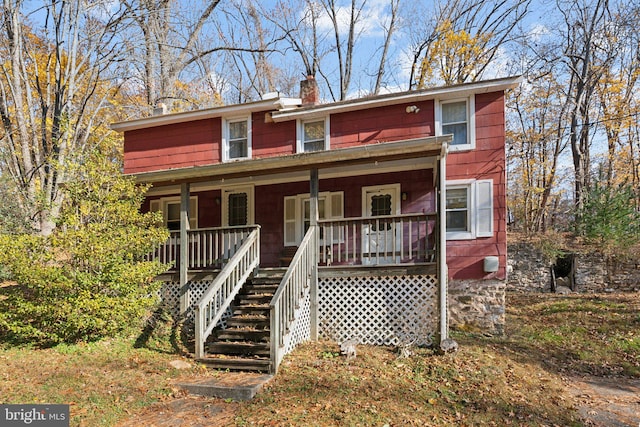 view of front of property featuring covered porch