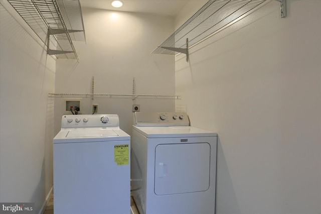 washroom featuring washer and dryer