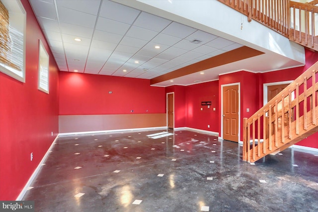 basement featuring a drop ceiling