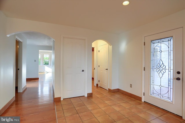 foyer entrance featuring light hardwood / wood-style flooring